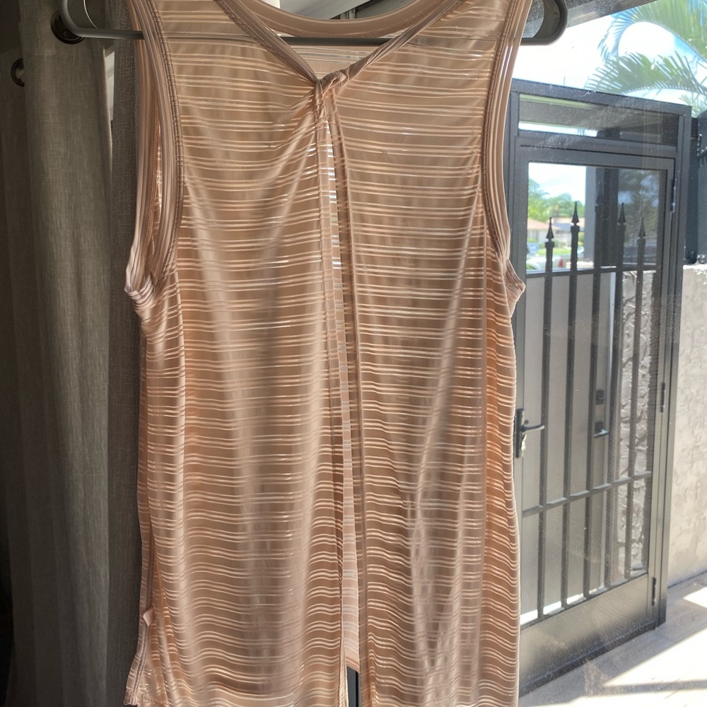 Gently used condition, sheer tie back tank